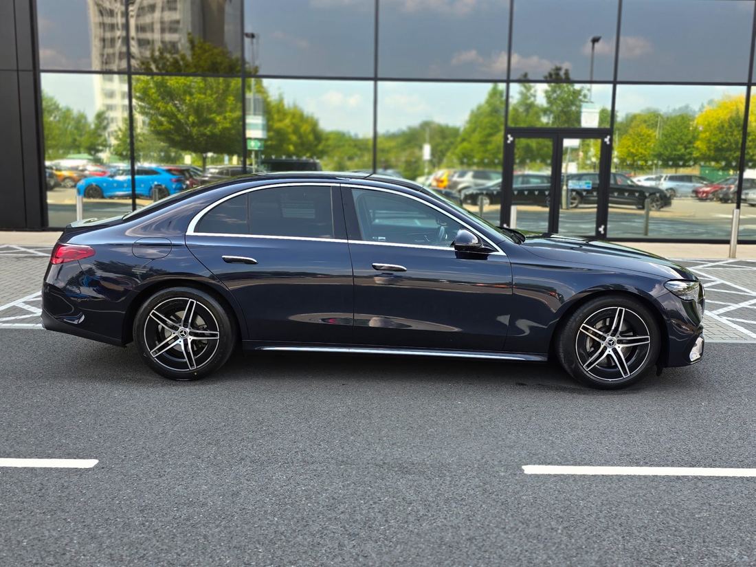 The BA Luxe Mercedes E-Class parked outside a showroom